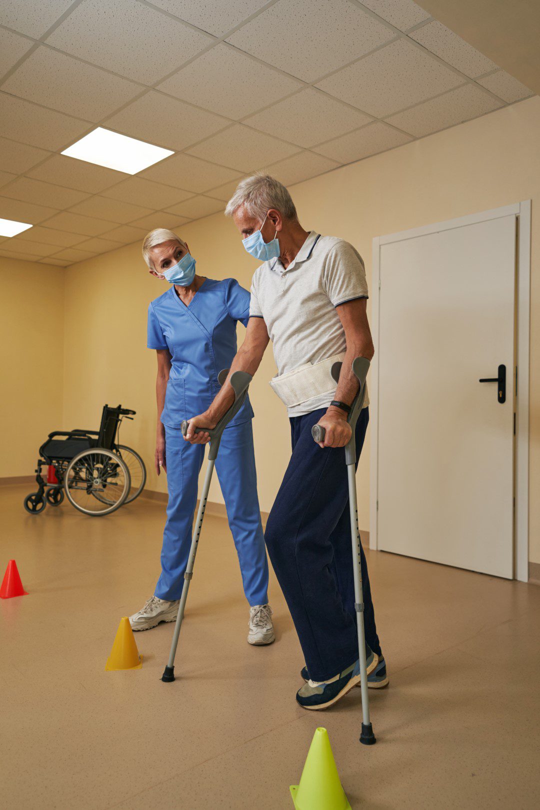 Physical therapist working with a workplace injury patient
